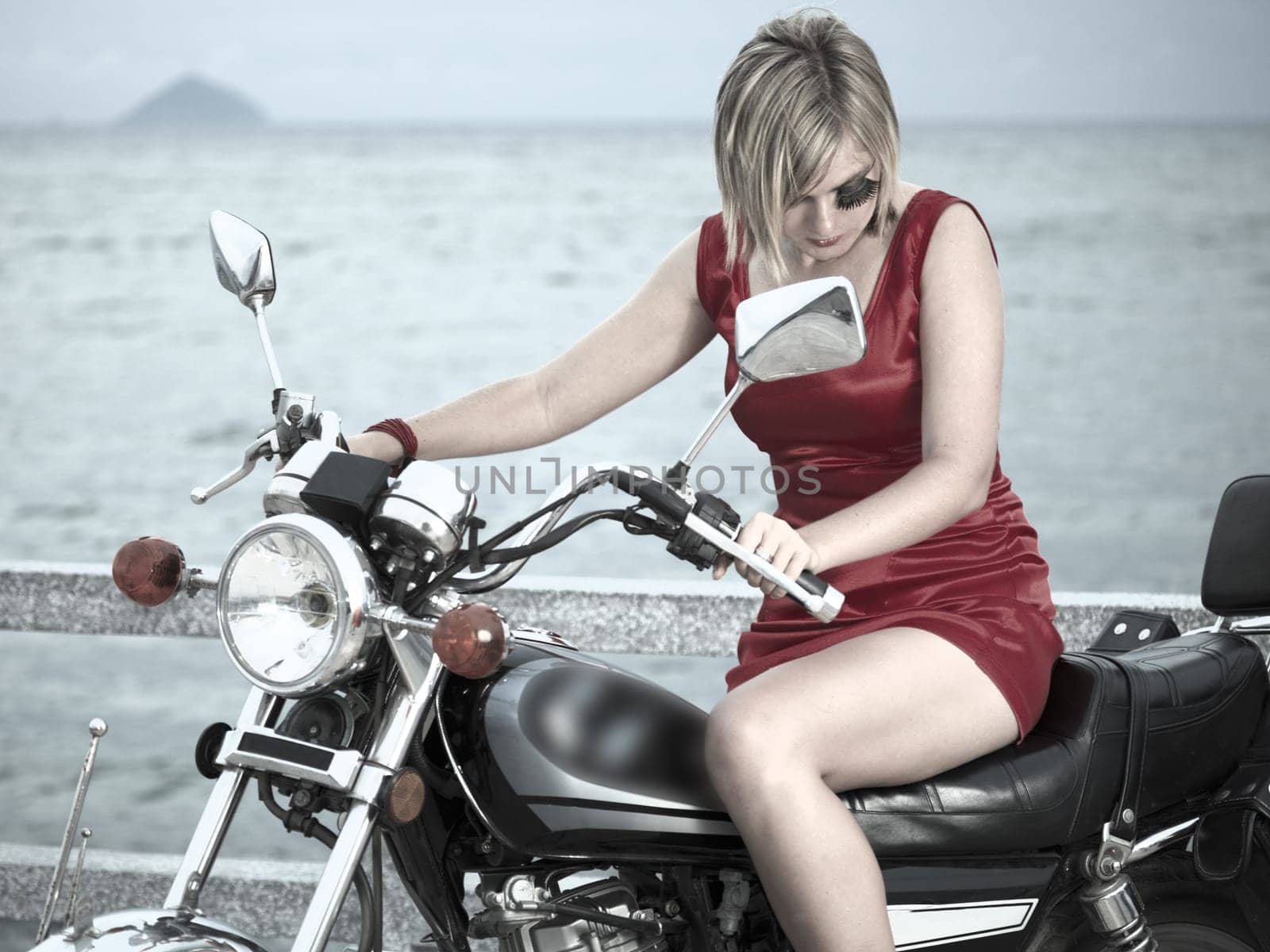 Fashion photo of young woman with a motorcycle