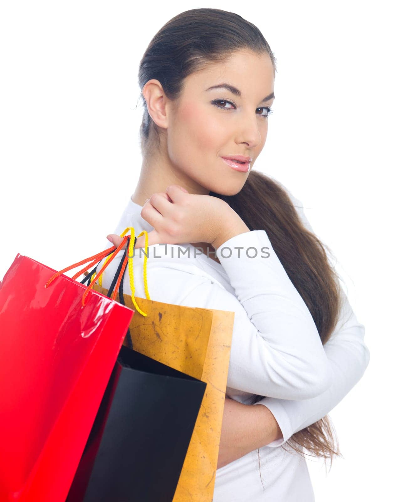 Attractive woman with paper shopping bags, isolated