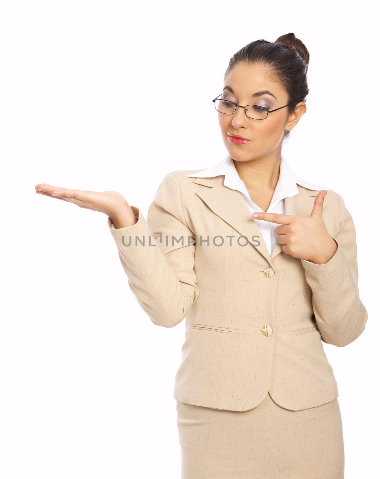 Business woman pointing at copy space on hand