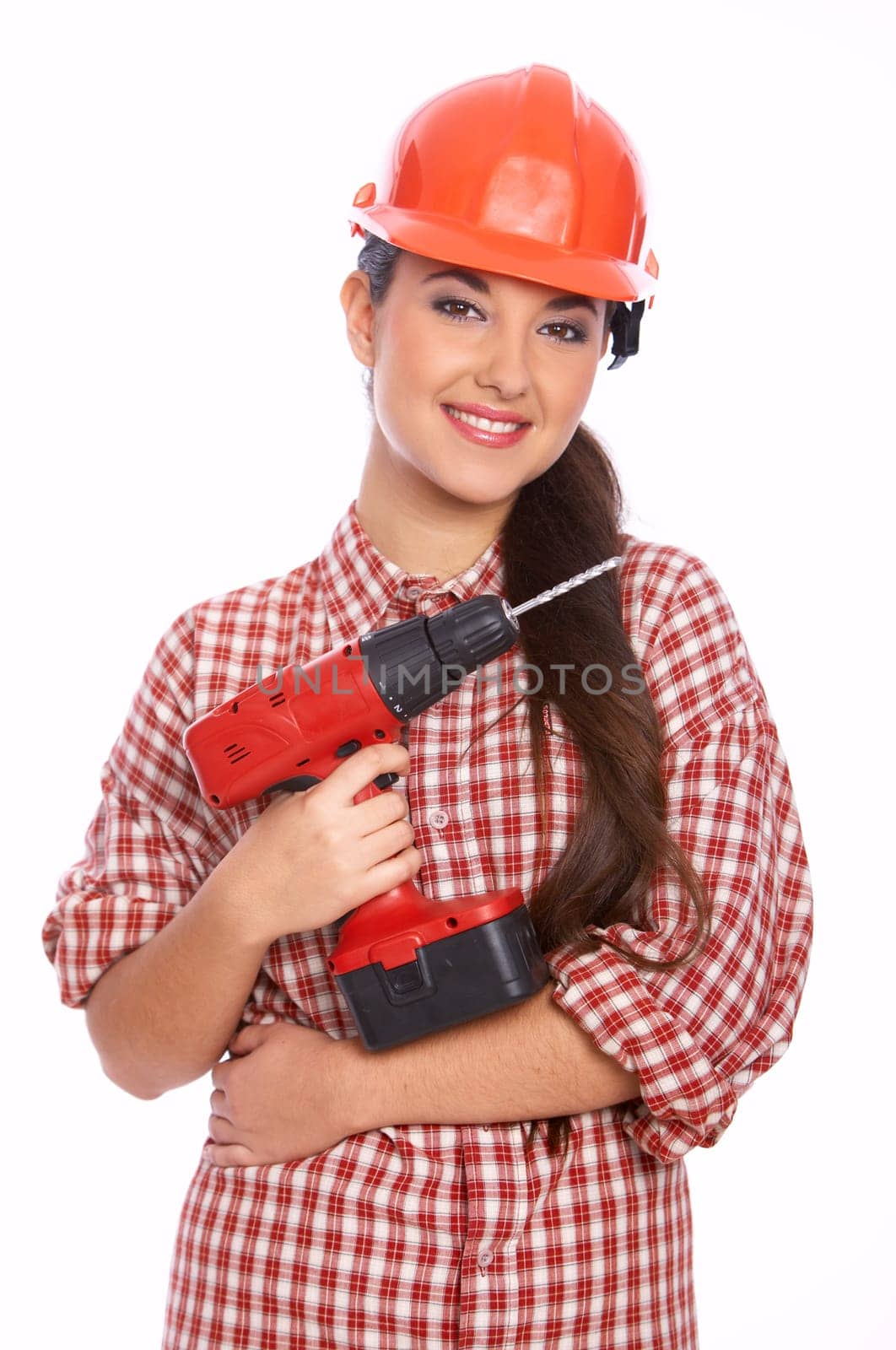 Female worker with drill in her hand, isolated