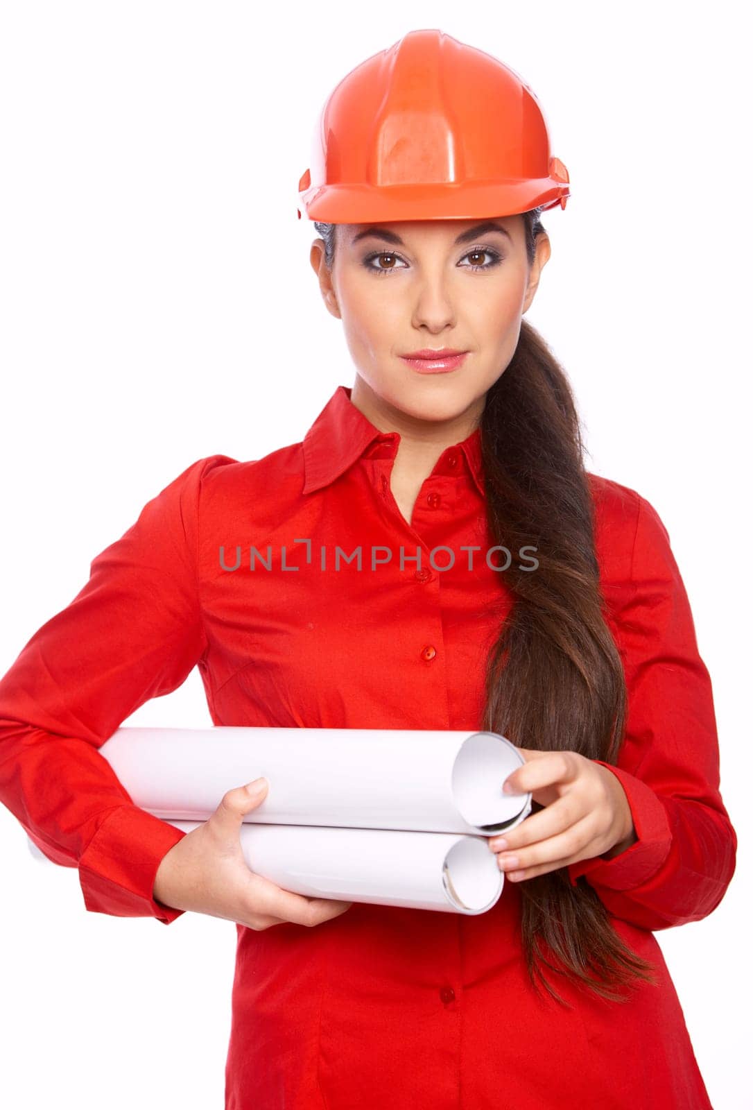 Female architect holding blueprints, isolated on white