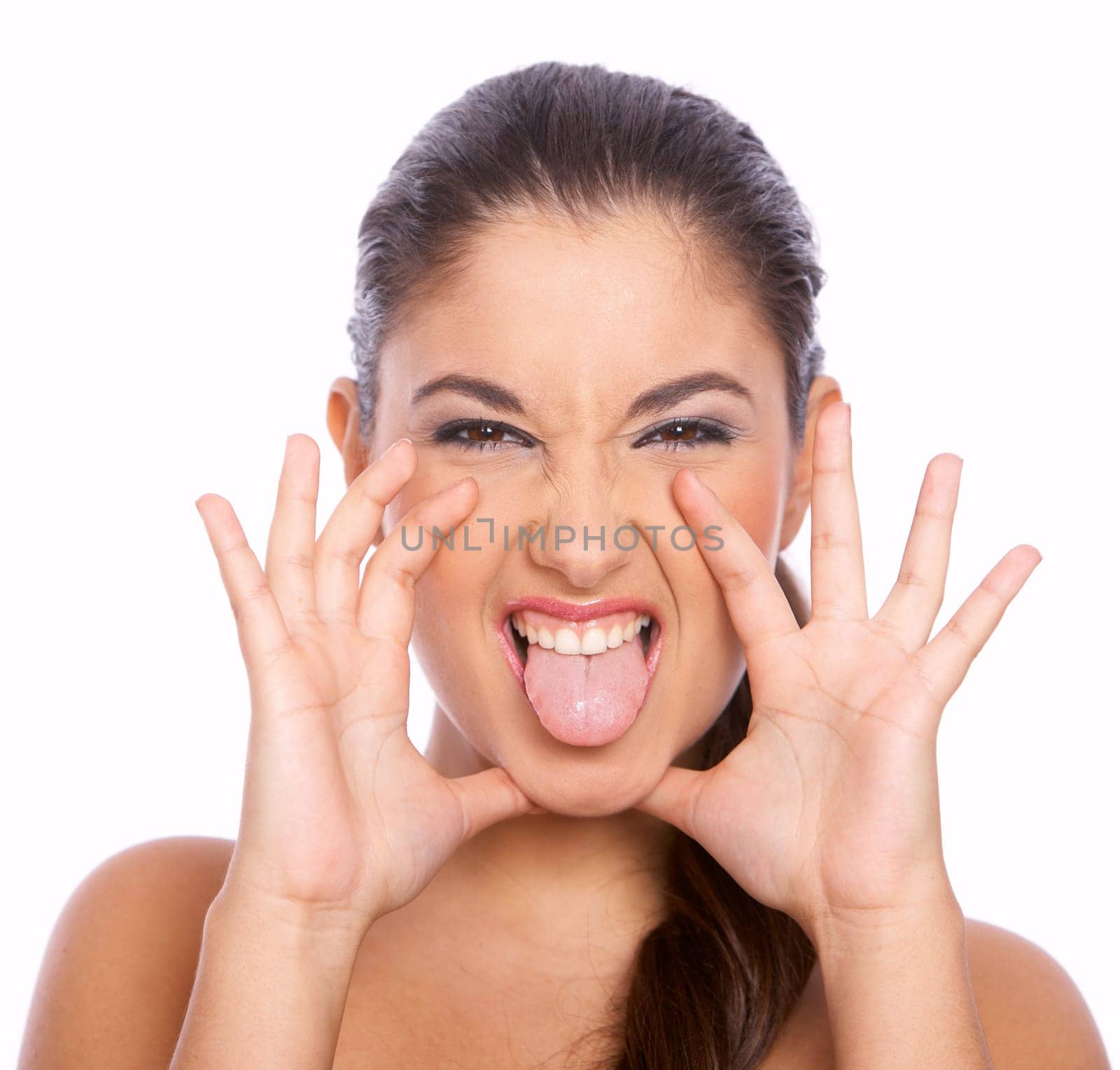 Portrait of beautiful woman who puts tongue out