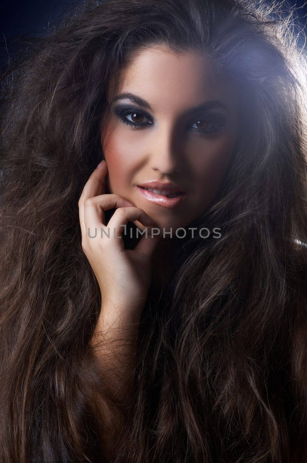 Portrait of beautyful fashion lady lighted by flare