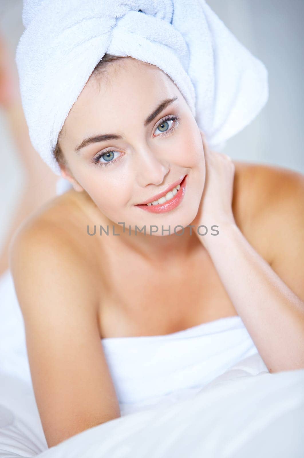 Portrait of cute teenage girl wearing towel on her head
