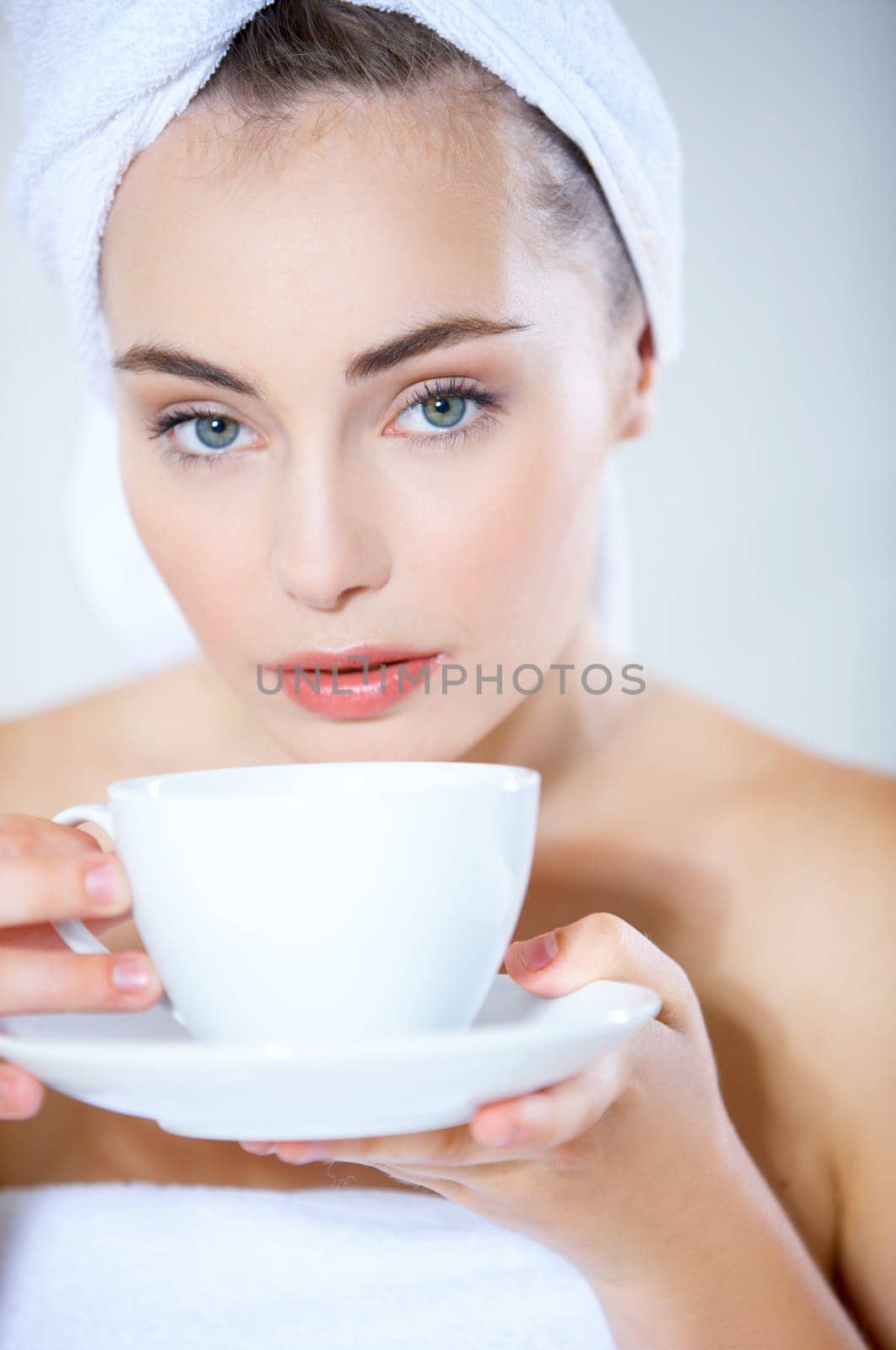 Portrait of cute teenage girl with cup of coffee