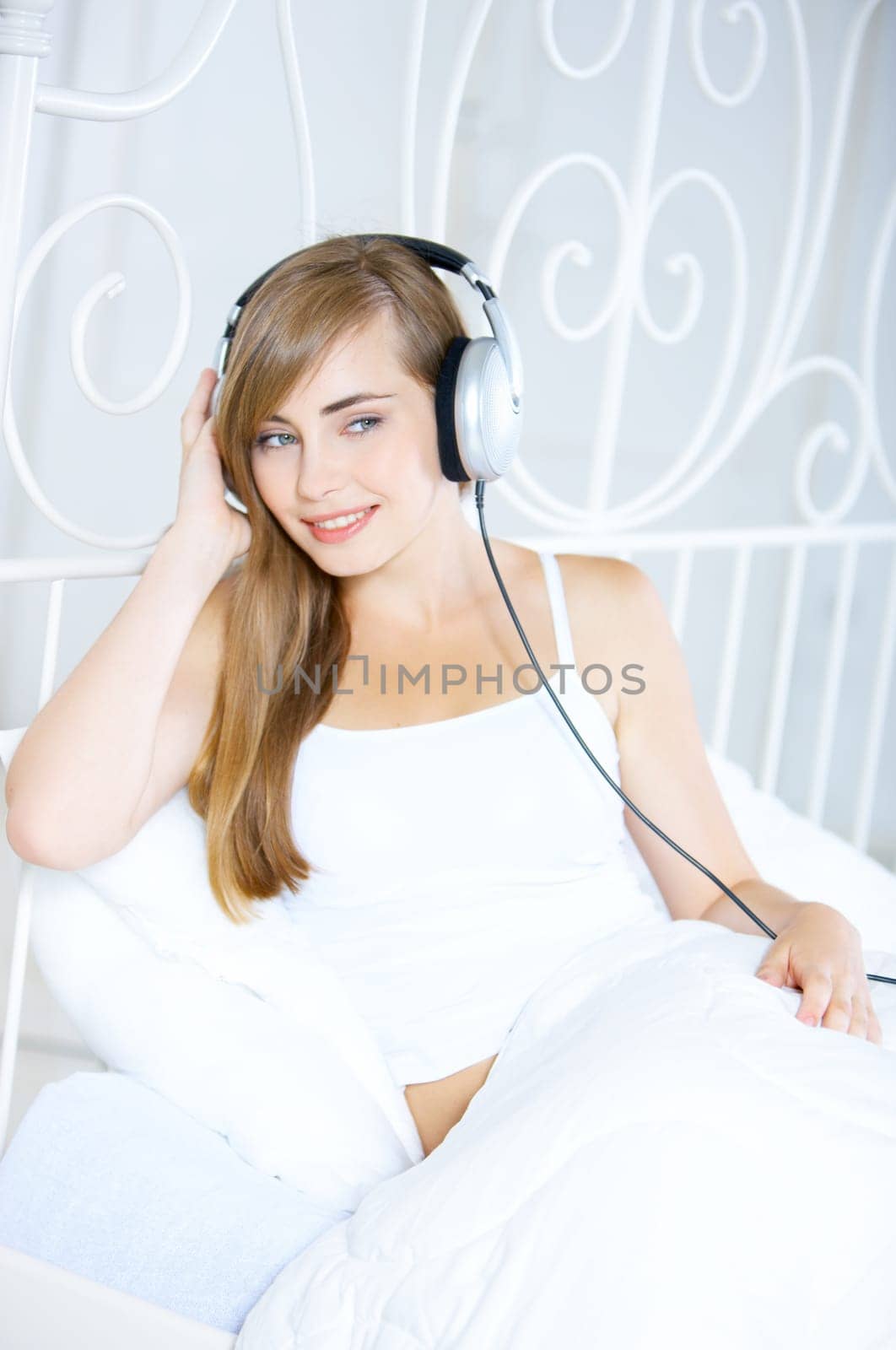 Portrait of cute teenage girl is listening music