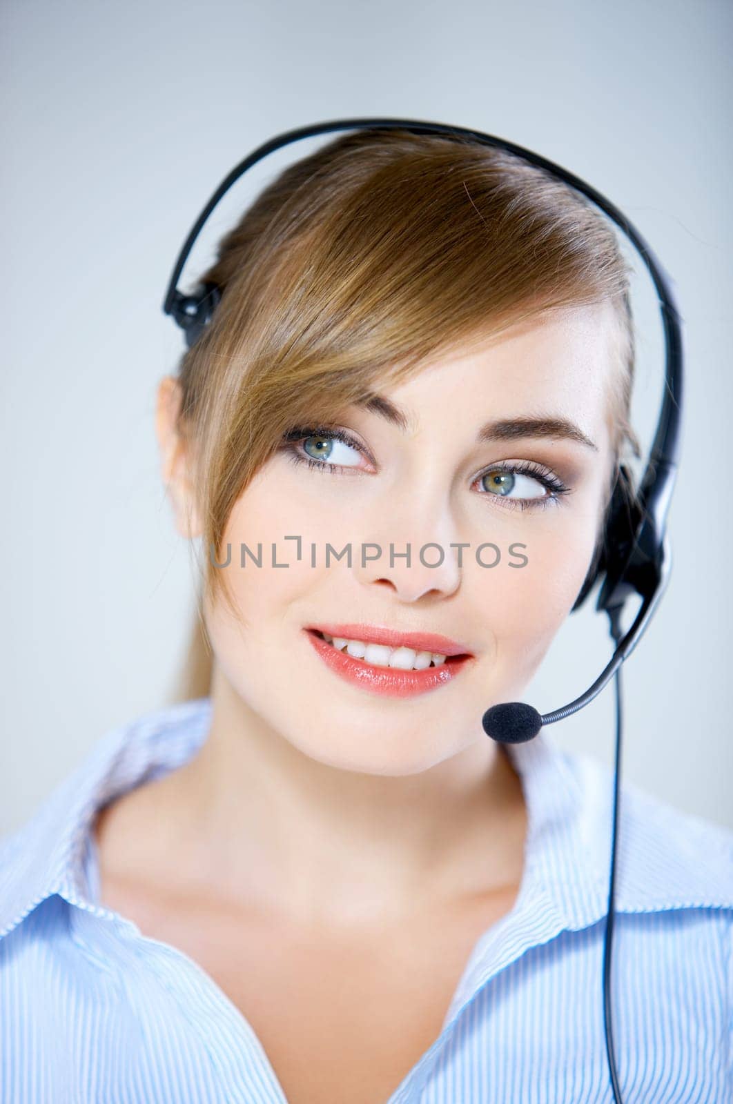Portrait of beautiful business woman with headset