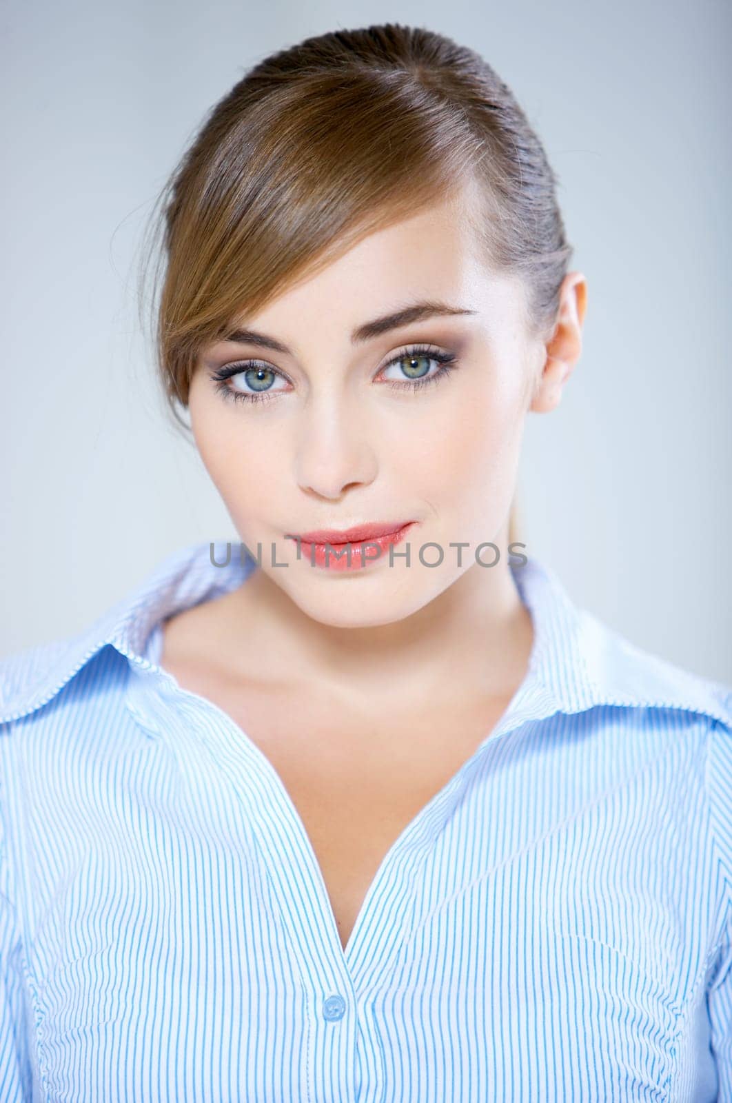 Portrait of beautiful business woman isolated on blue