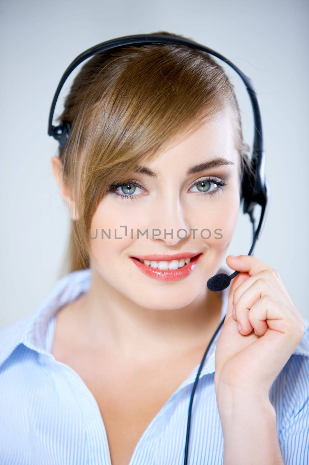 Portrait of beautiful business woman with headset
