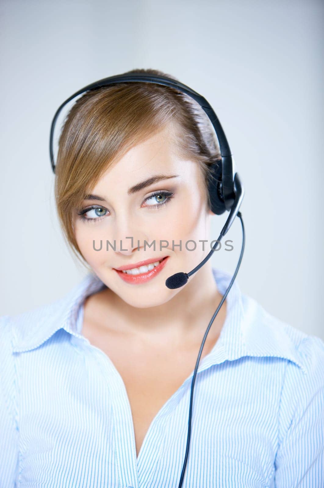 Portrait of beautiful business woman with headset