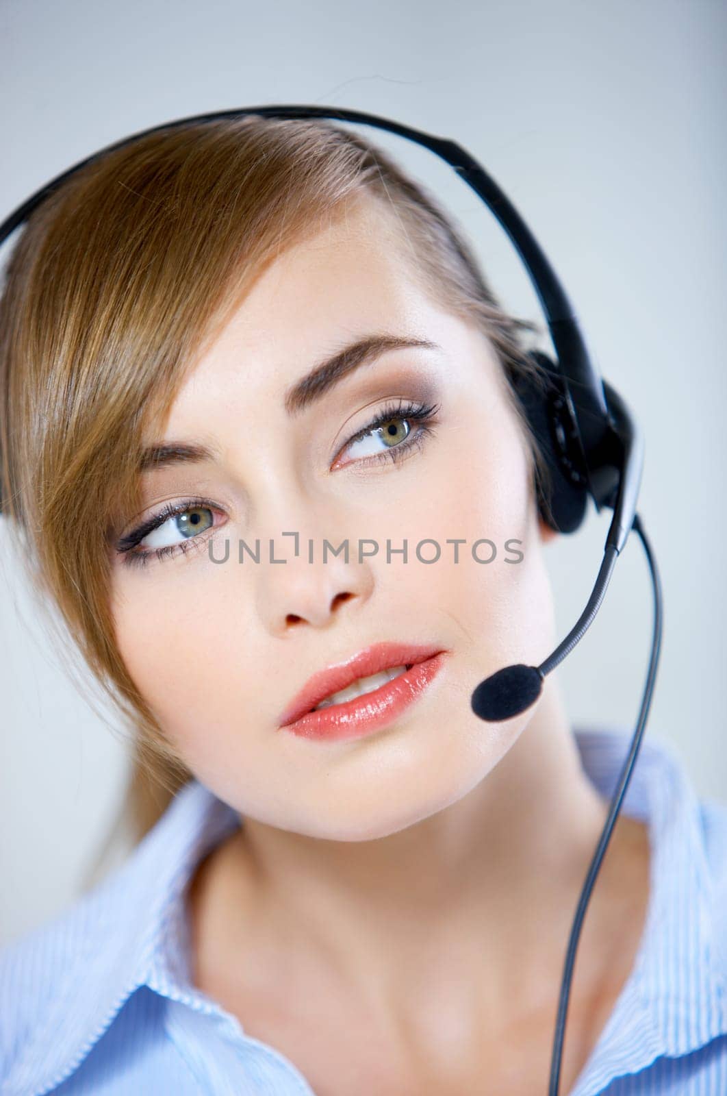Portrait of beautiful business woman with headset