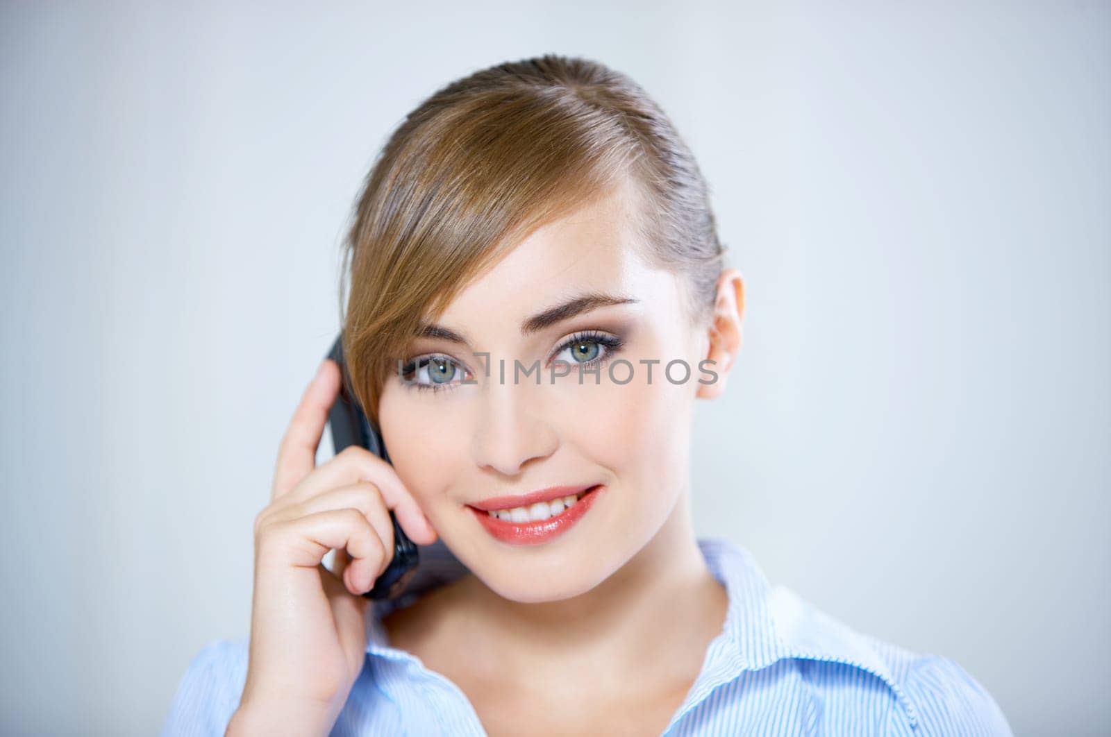 Portrait of beautiful business woman using mobile phone