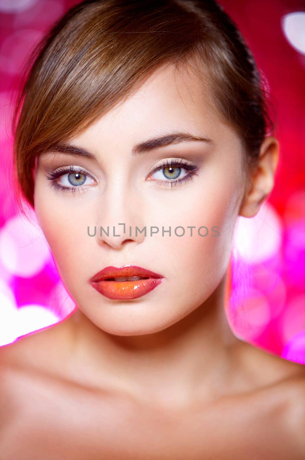 Portrait of beautiful young sexy woman on red background