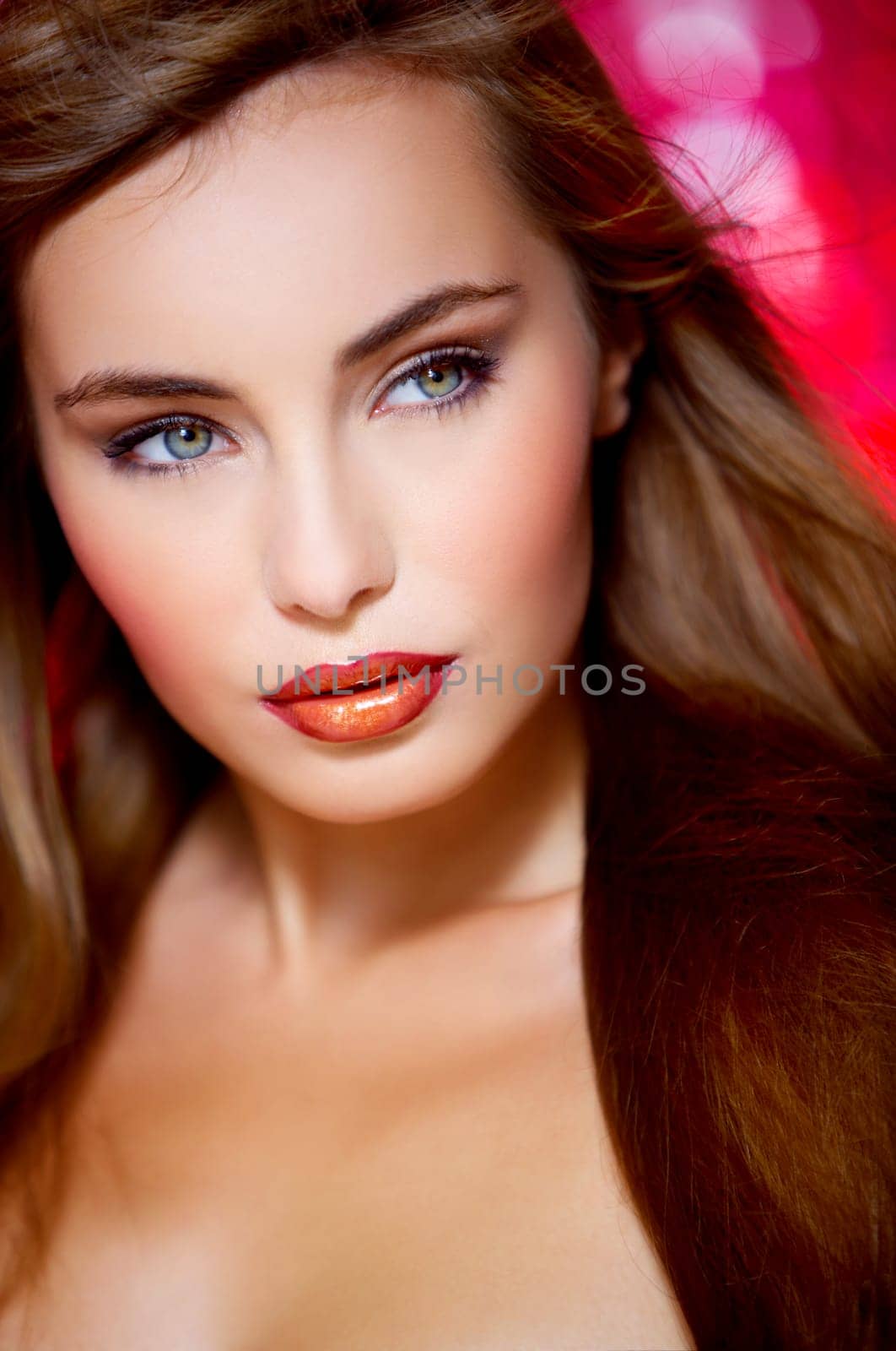 Portrait of beautiful young sexy woman on red background