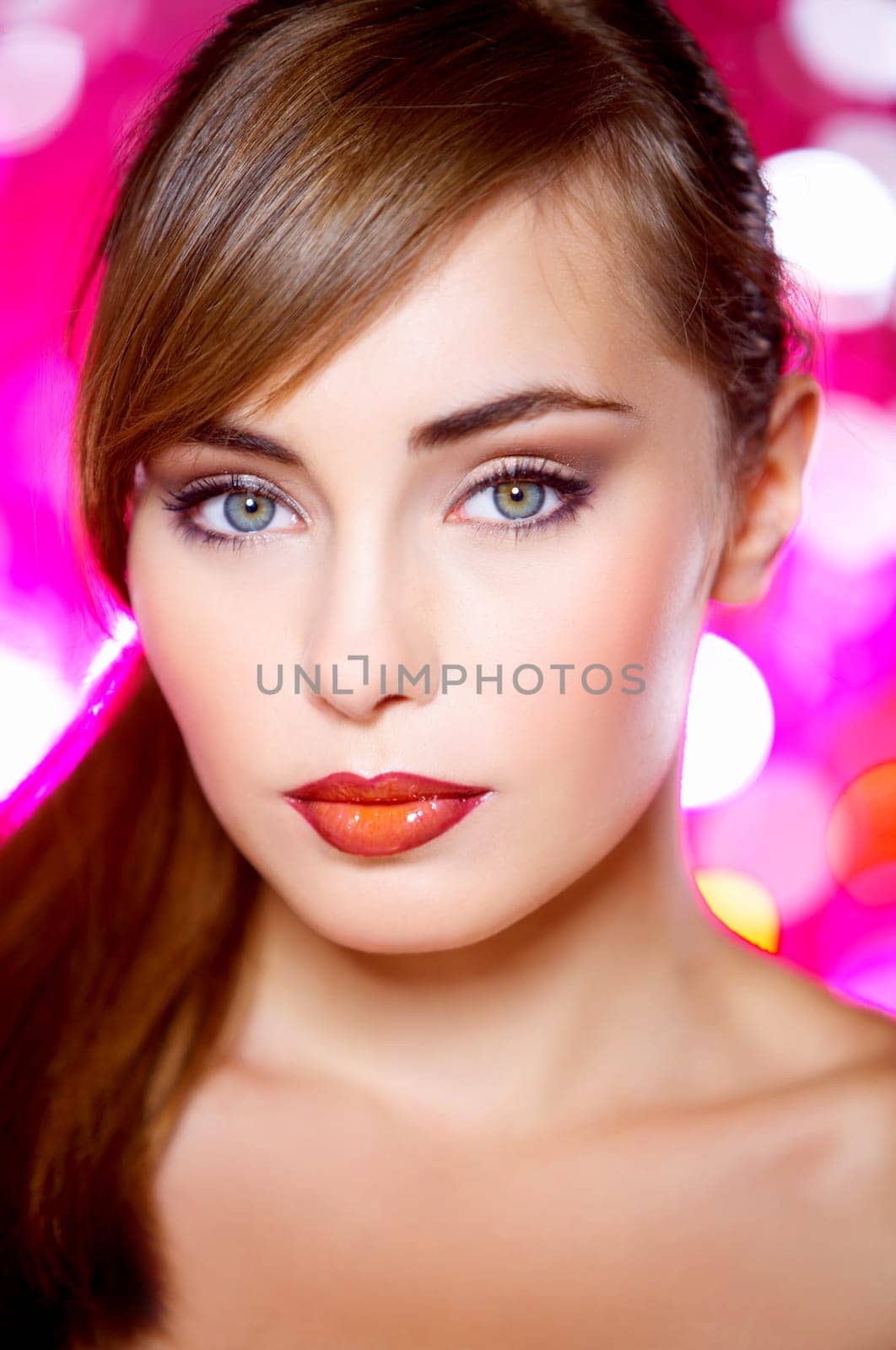 Portrait of beautiful young sexy woman on red background