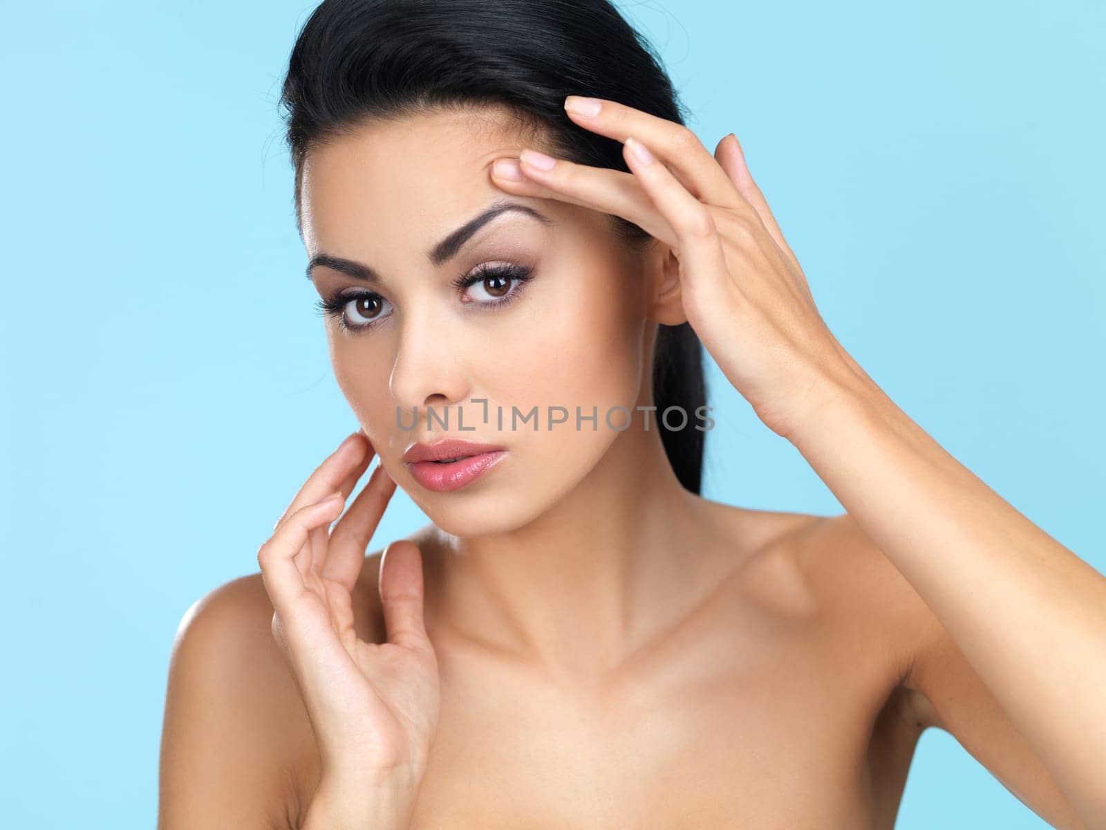 Portrait of beautiful woman looking at camera
