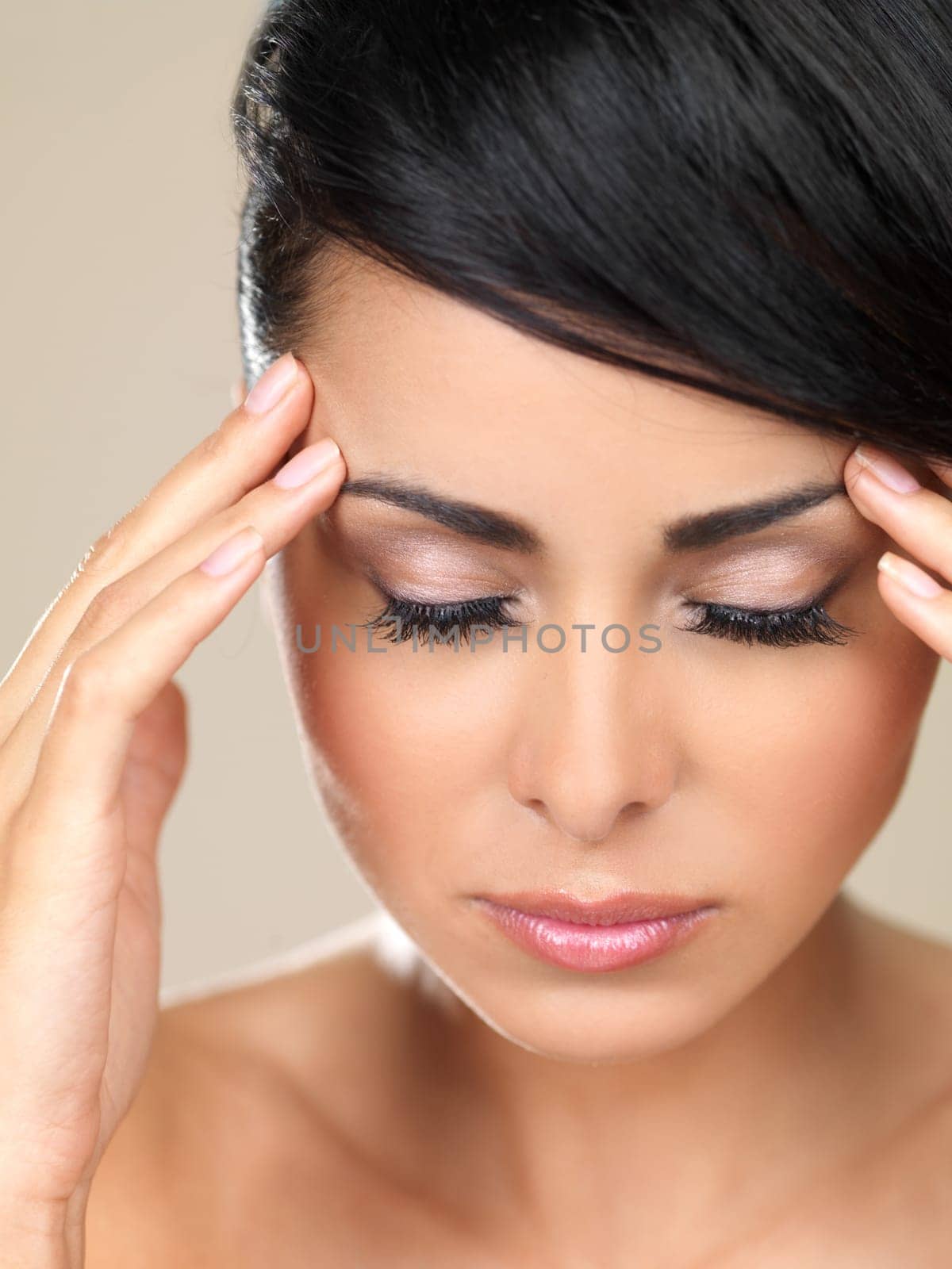 Portrait of beautiful woman, she has migraine
