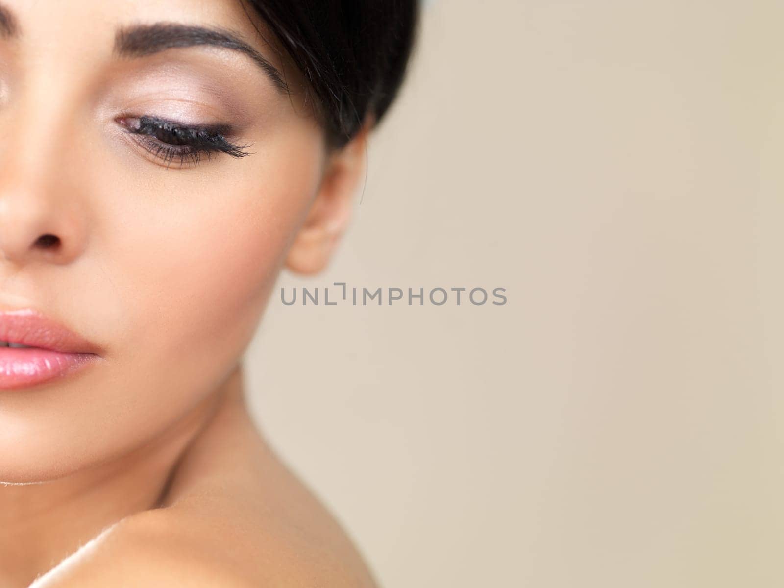 Portrait of beautiful woman looking on her left
