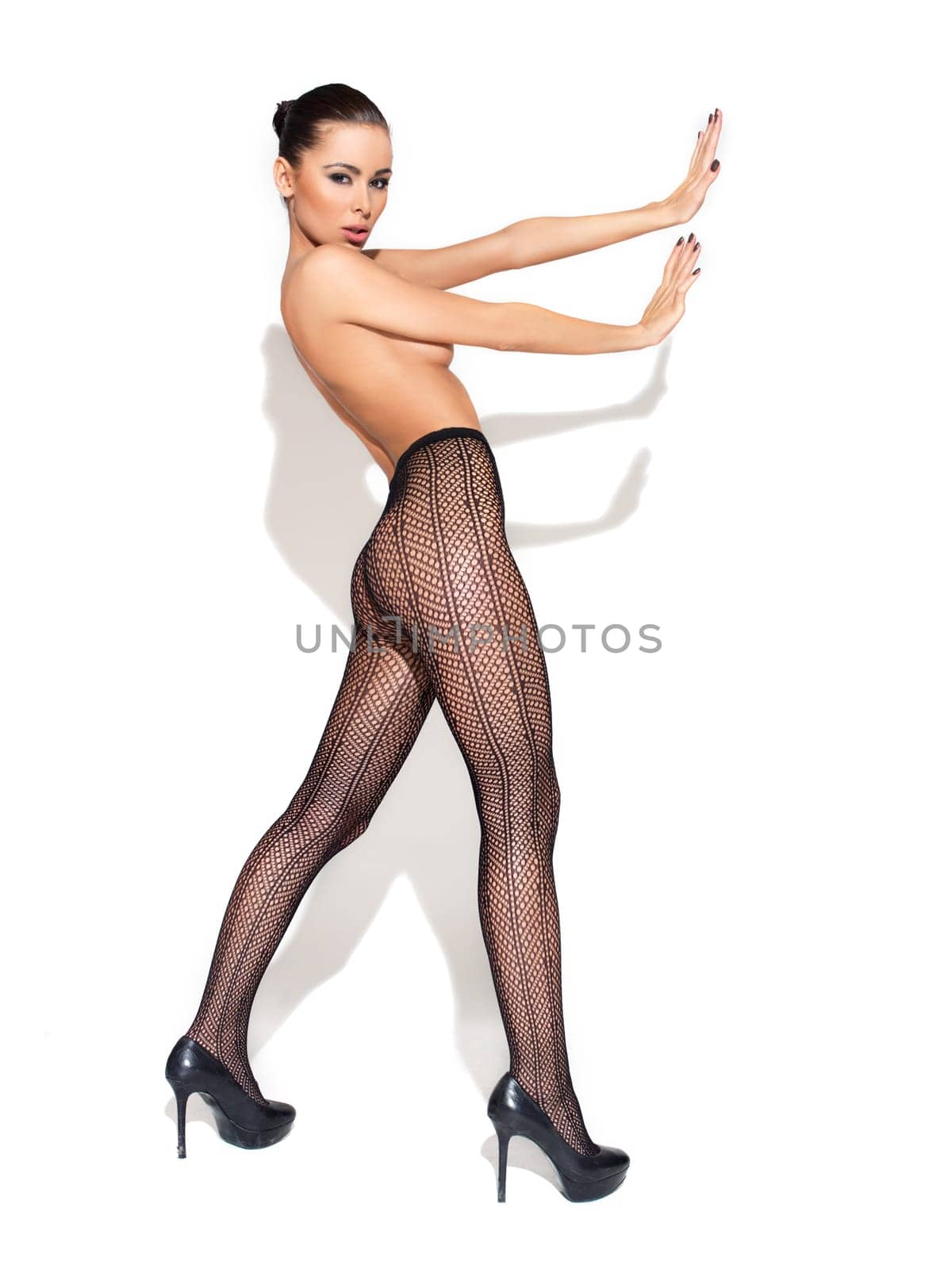 Adorable female in black stockings with copyspace