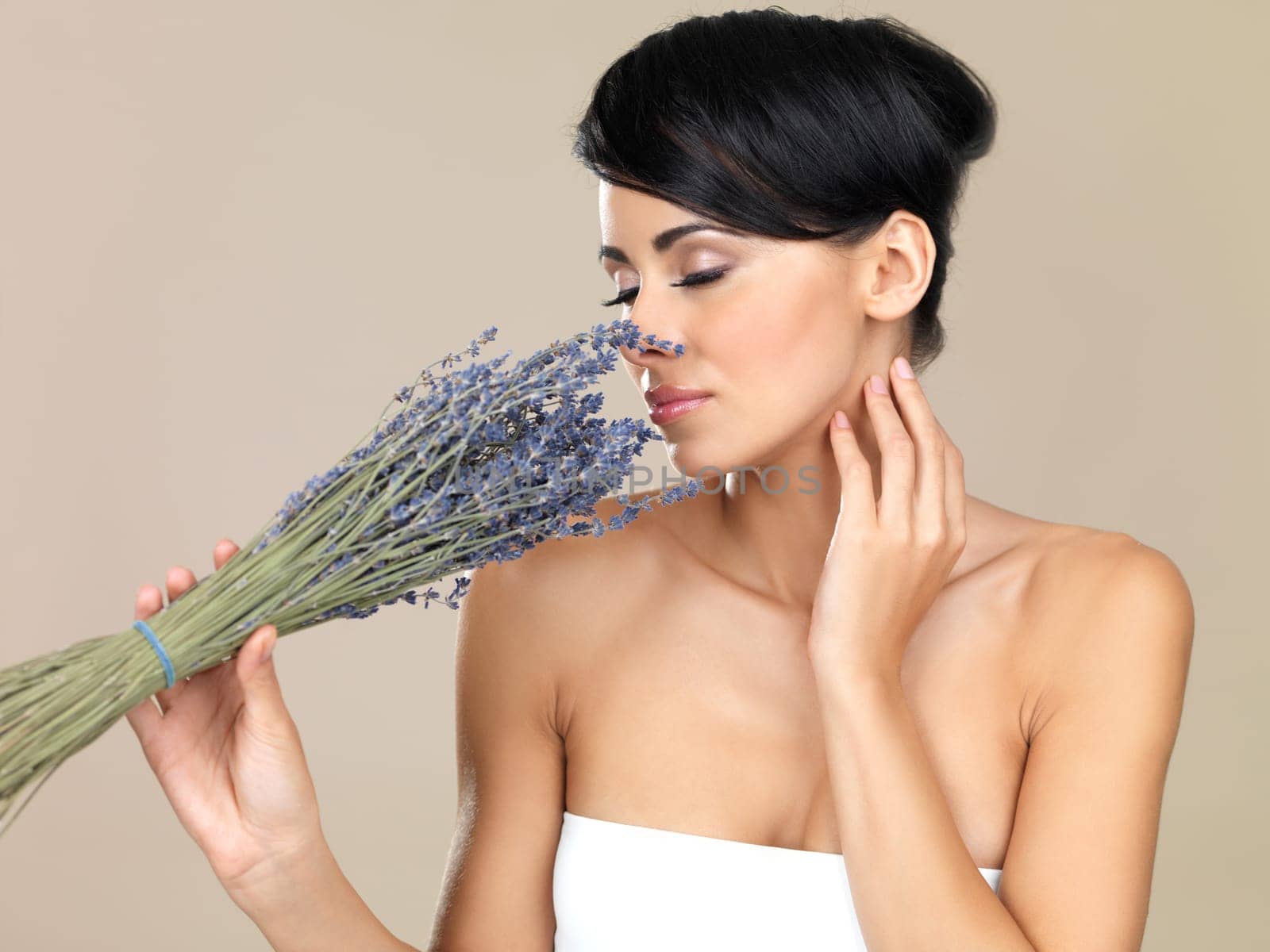 Portrait of beautiful woman, she holding bunch of lavender