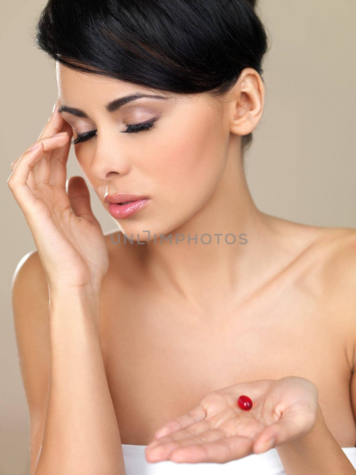 Portrait of beautiful woman, she has migraine