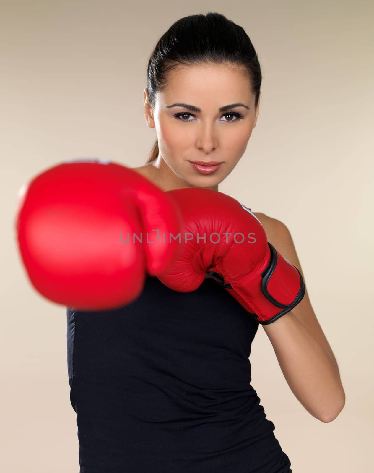 Young beautiful woman during fitness and boxing