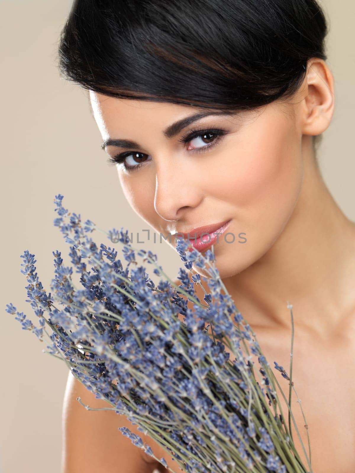 Portrait of beautiful woman, she holding bunch of lavender