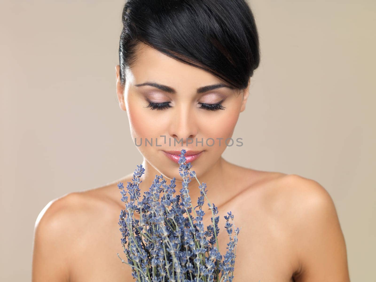 Portrait of beautiful woman, she holding bunch of lavender