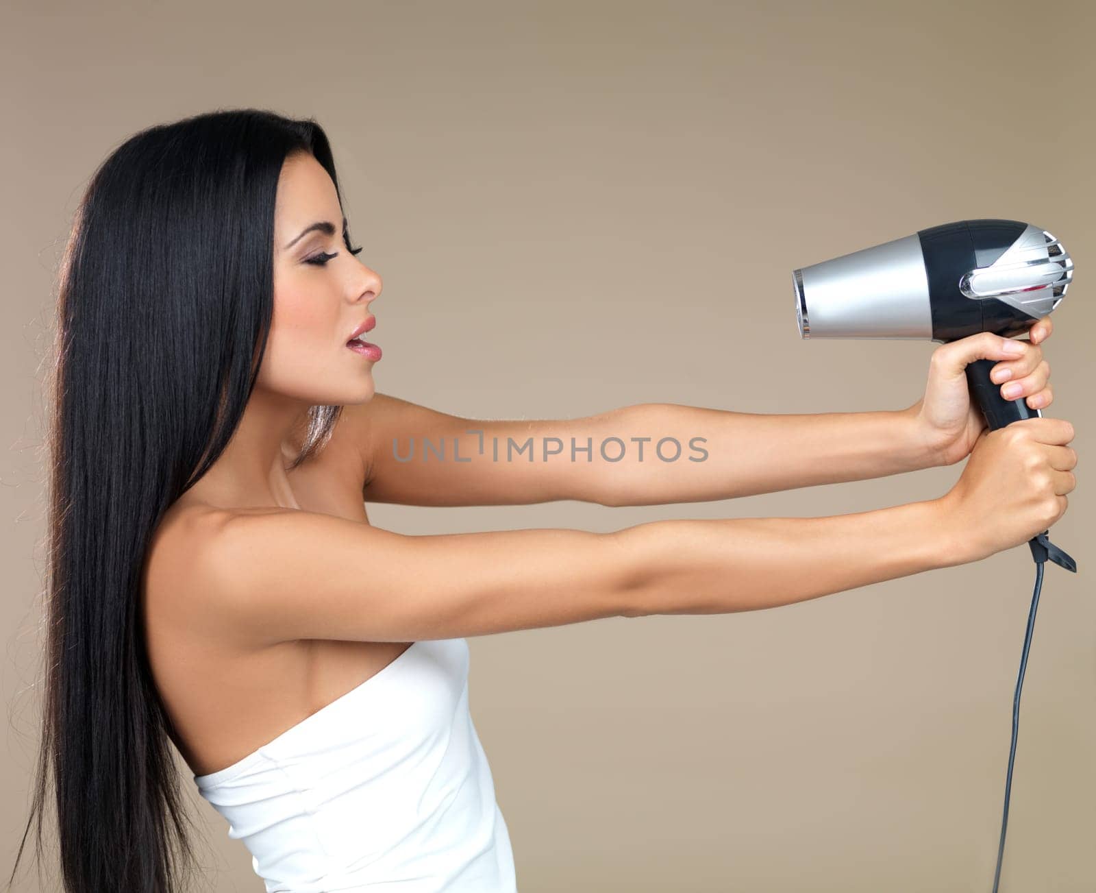 Portrait of beautiful woman, she holding hair dryer