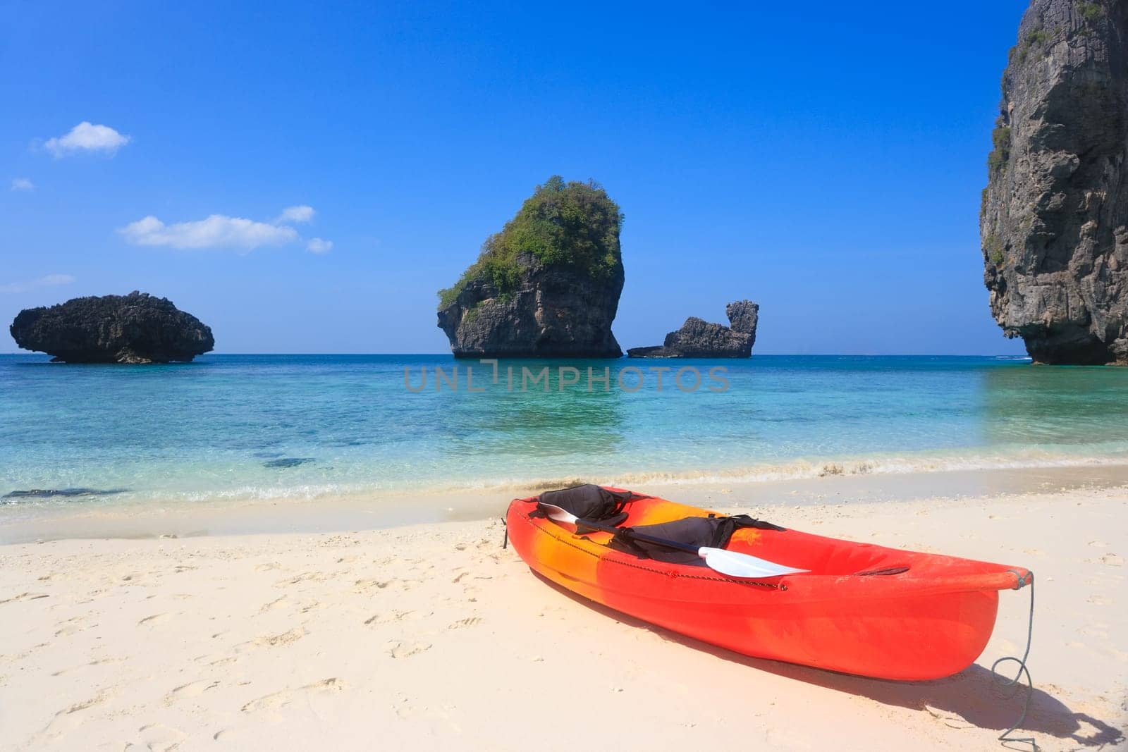 Bright kayak in a tropical lagoon. Phi phi island