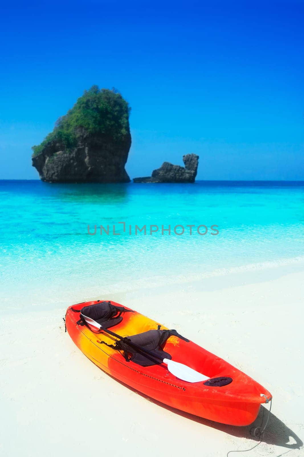 Bright kayak in a tropical lagoon. Phi phi island