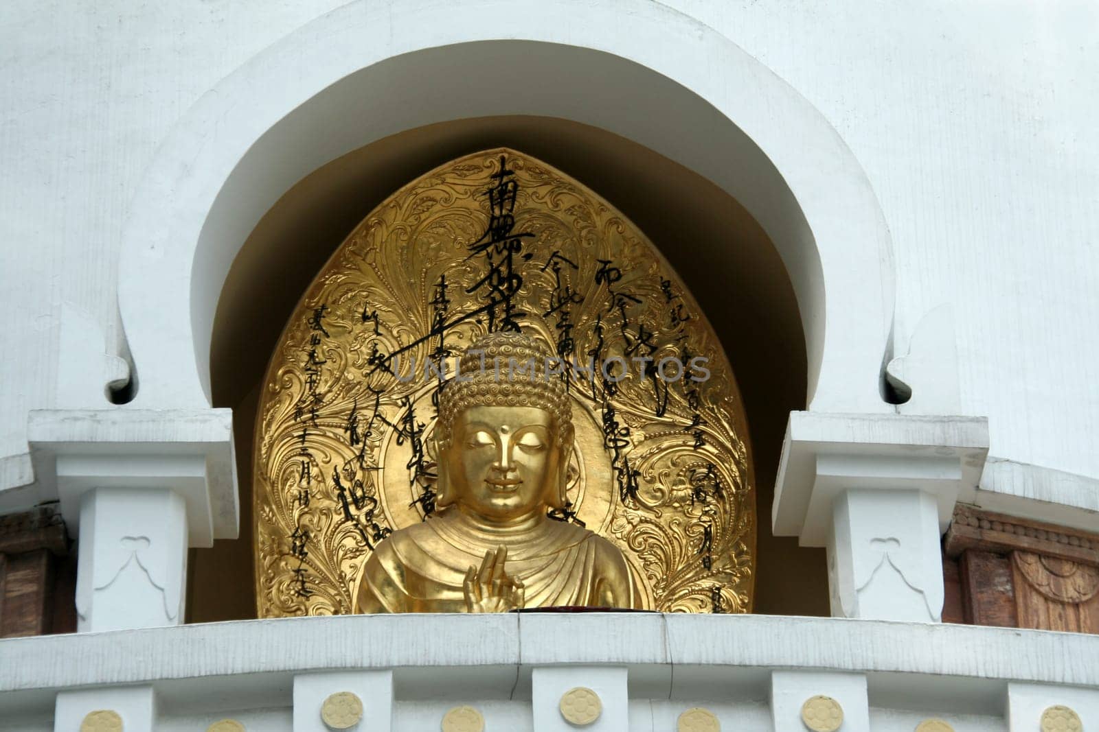 Golden image of Buddha in Buddhist Stupa in Darjeeling, West Bengal, India, Asia