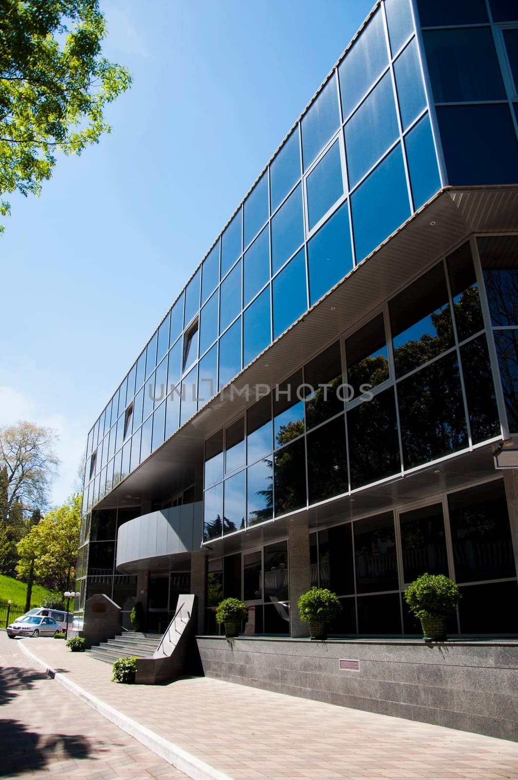 Input in modern office building and sidewalk