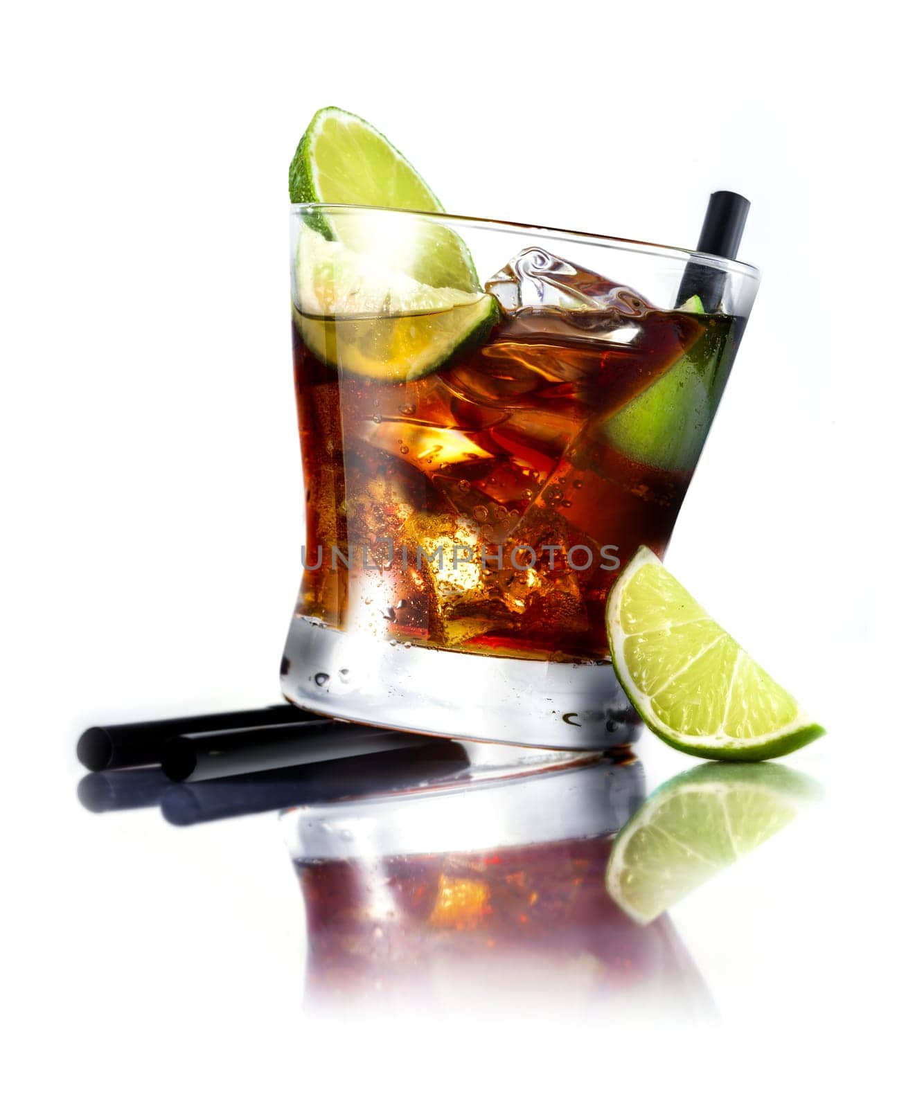 Cuba Libre Cocktail with rum and fresh lime isolated on white background, for drink concepts.