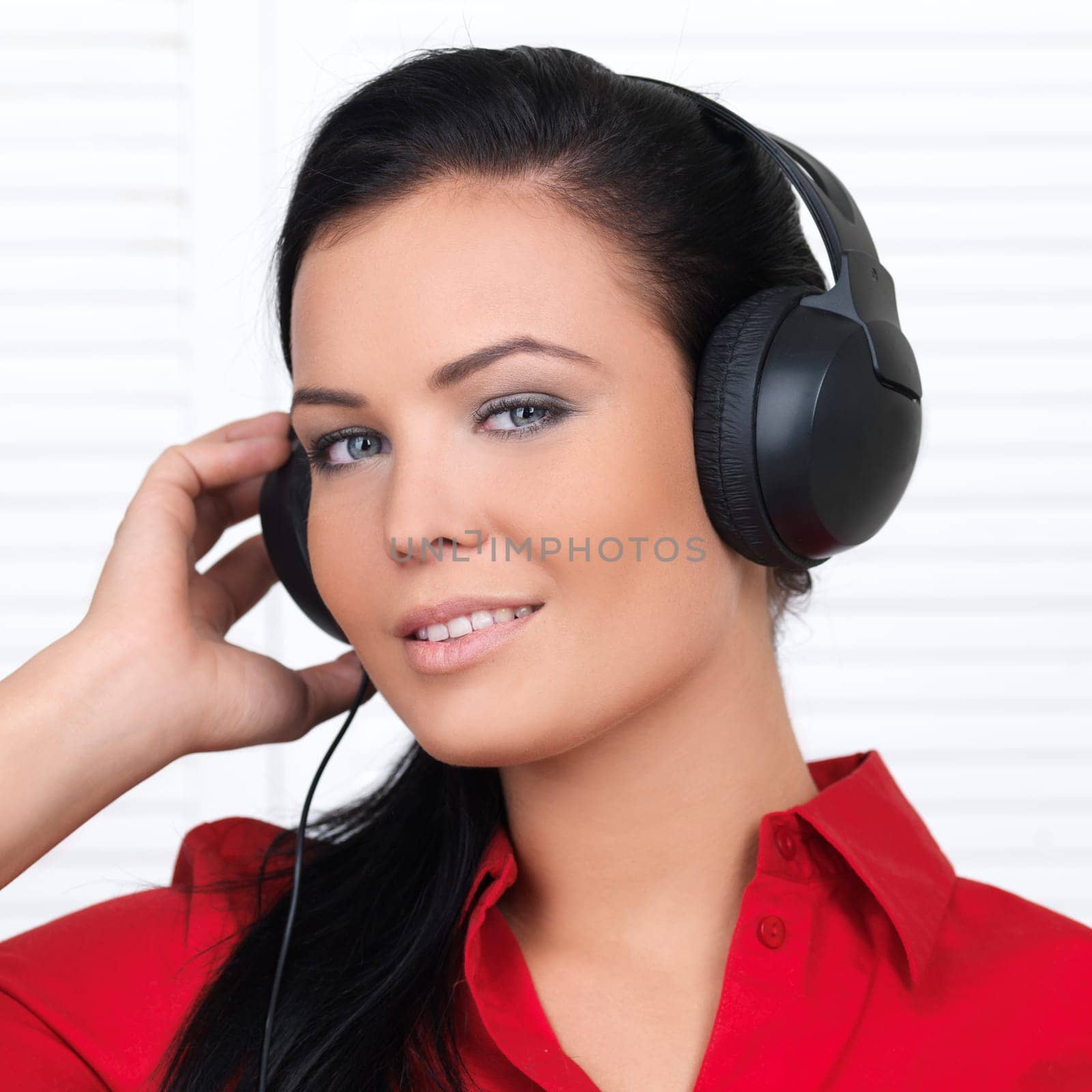 Portrait of beautiful woman, she is listen to the music