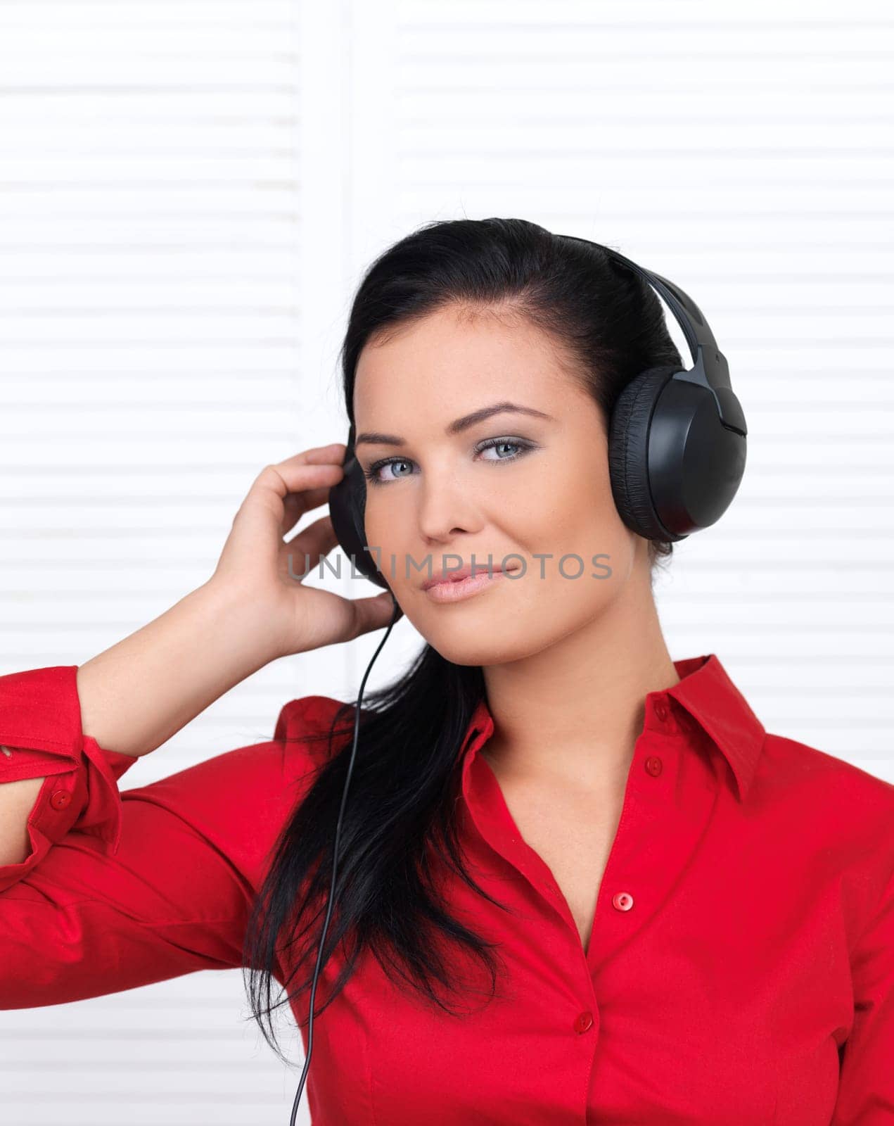 Portrait of beautiful woman, she is listen to the music