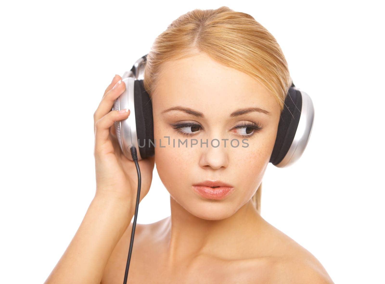 Portrait of cute blond woman, she is listen music