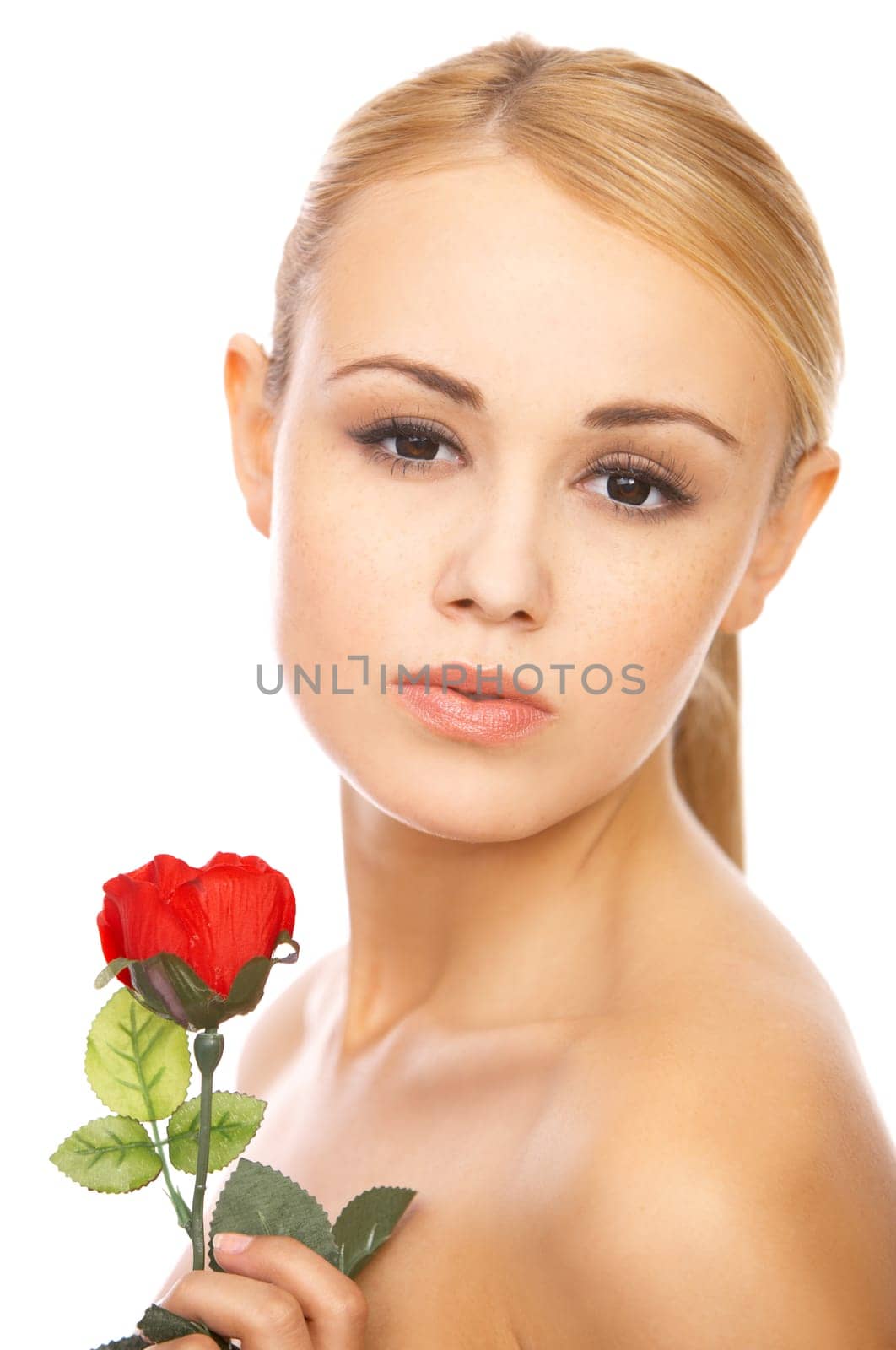 Portrait of cute blond woman, holding red rose