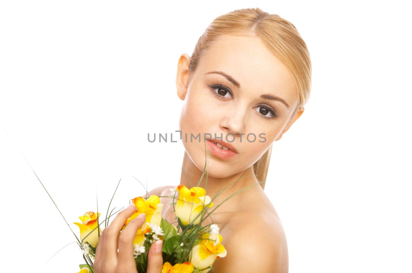 Portrait of cute blond woman, holding bunch of roses
