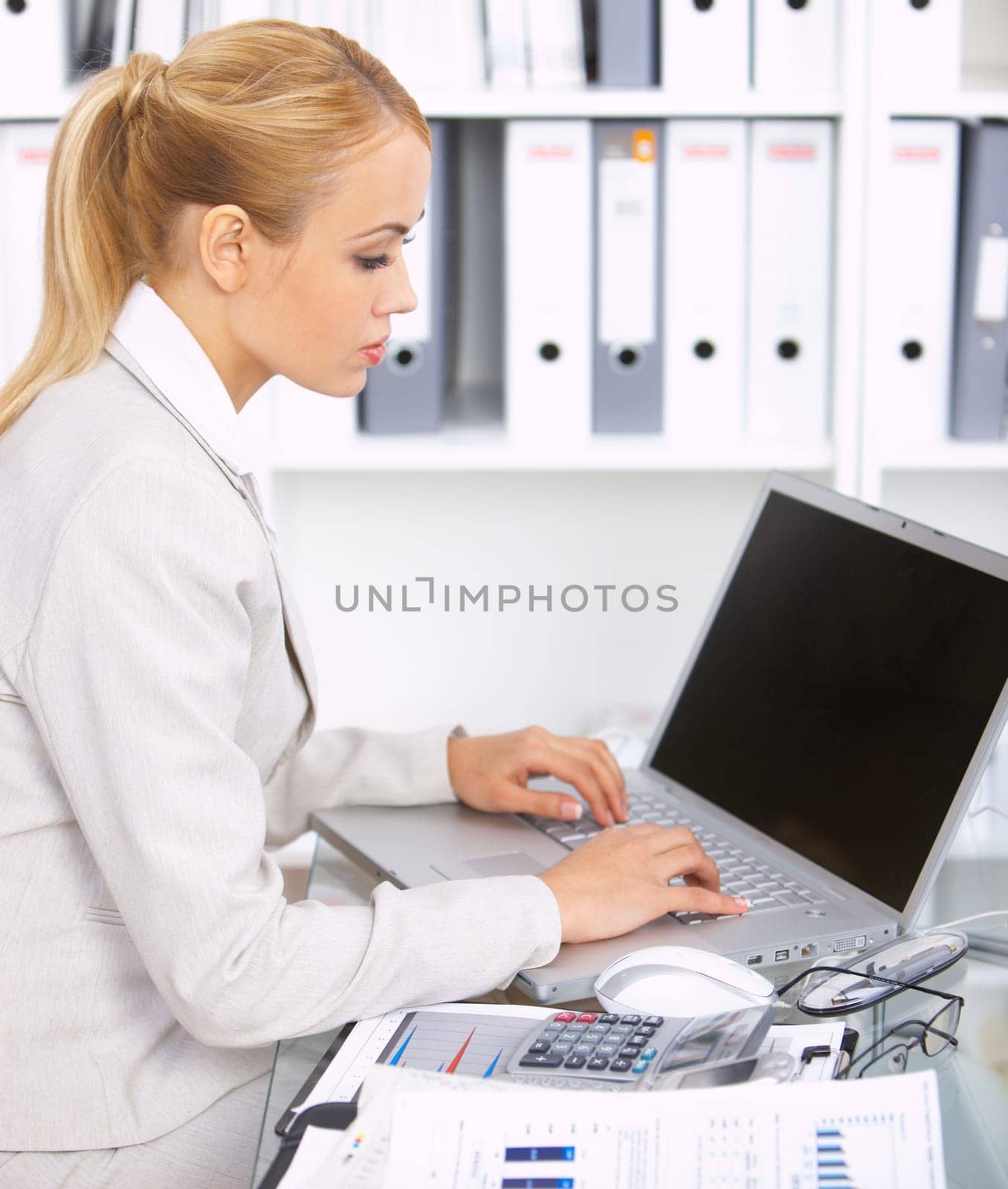 Young Beautiful business woman working in office