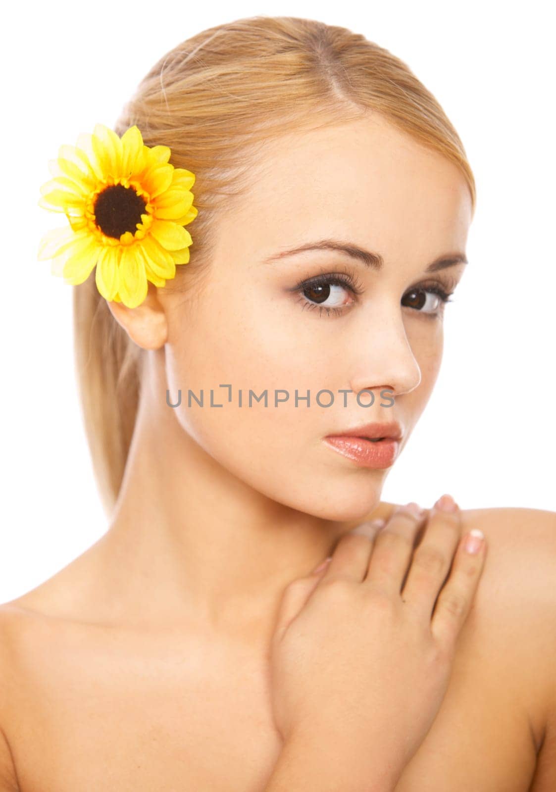 Portrait of cute blond woman,with flower in hairs