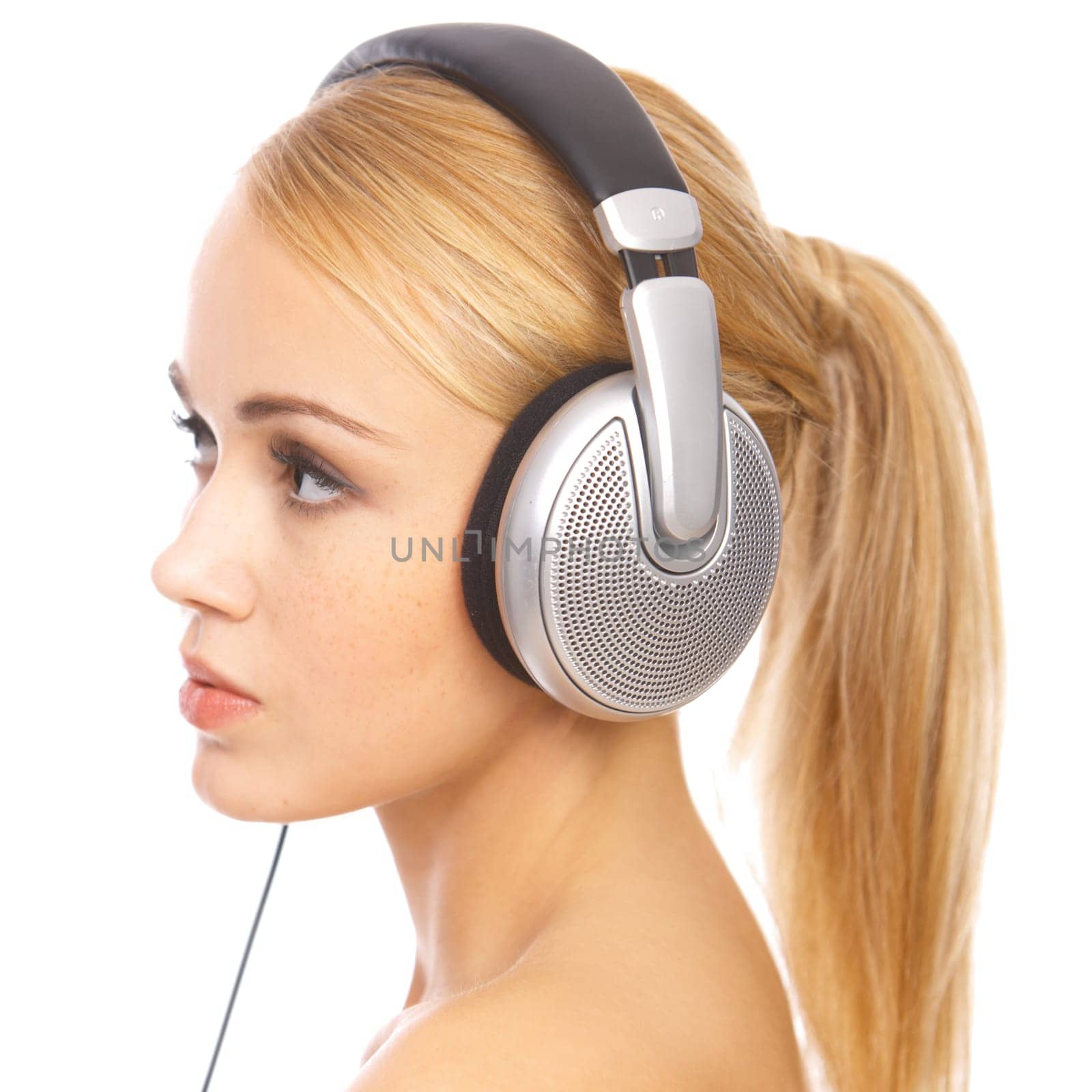 Portrait of cute blond woman, she is listen music