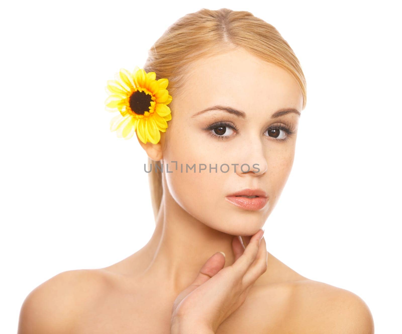 Portrait of cute blond woman,with flower in hairs