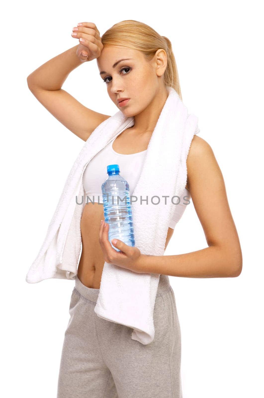 Portfait of Sporty beautiful girl holding bottle of water