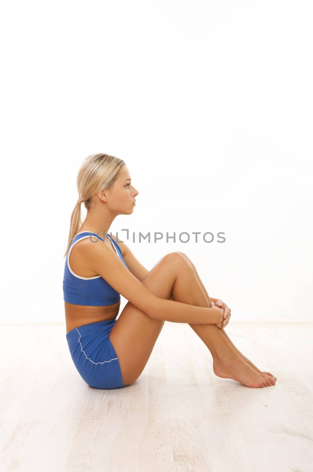 Young beautiful woman during fitness time and exercising