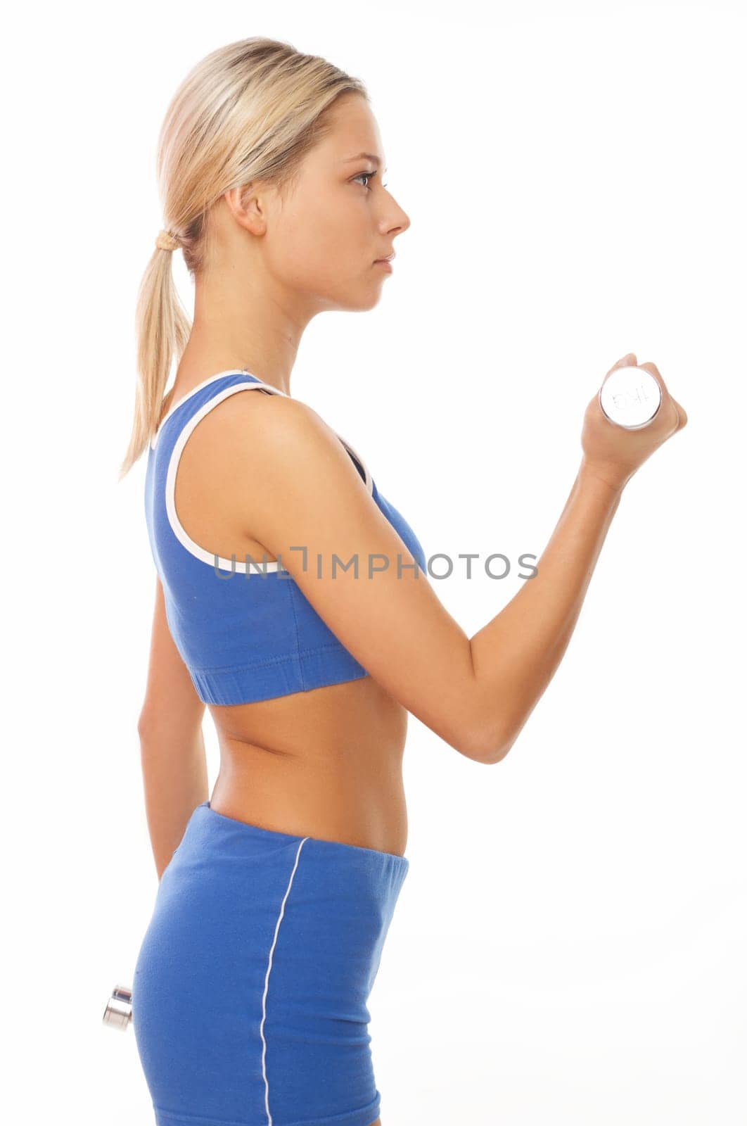 Young beautiful woman during fitness time and exercising