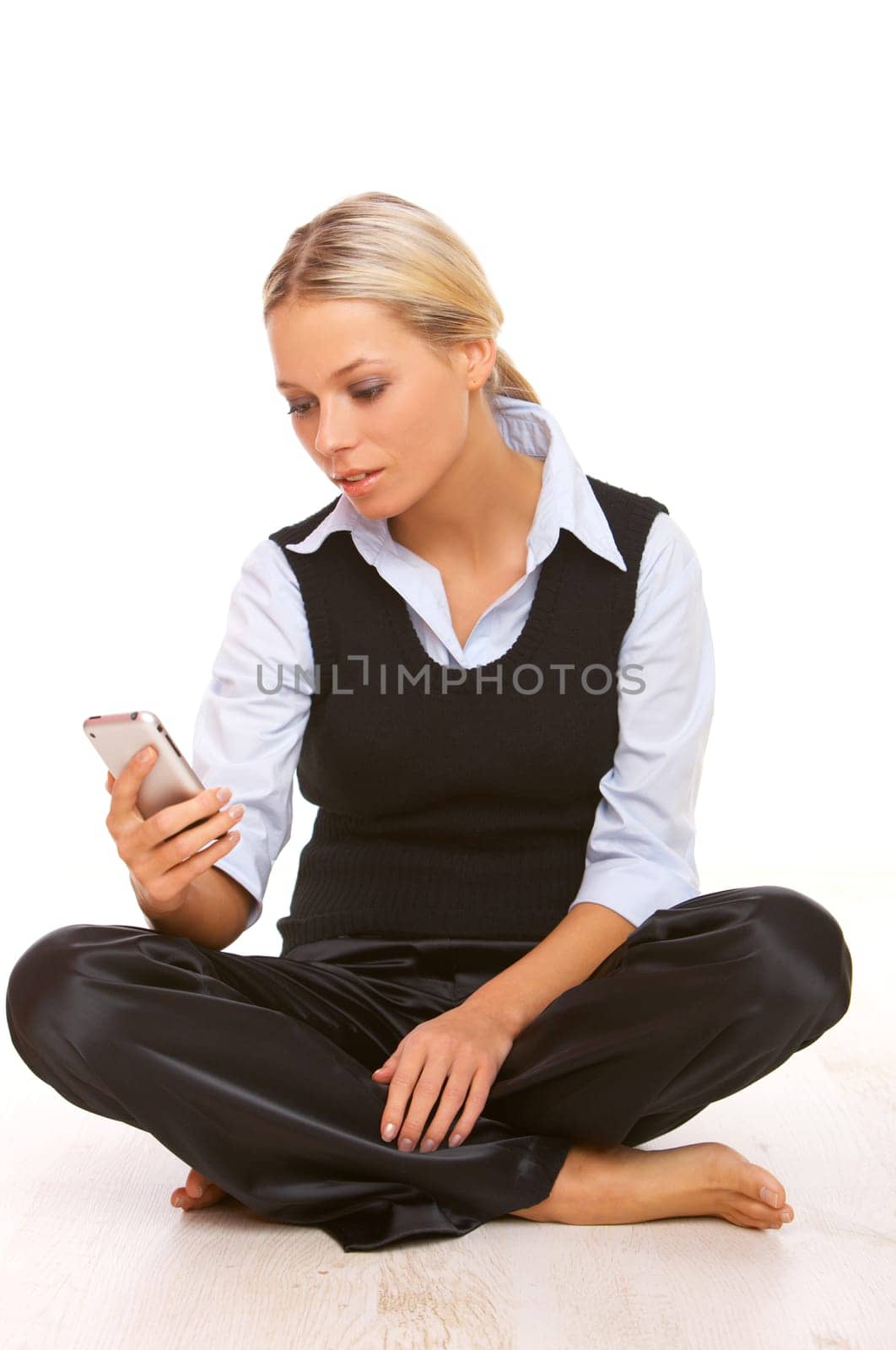 Young business woman is talking by cell phone