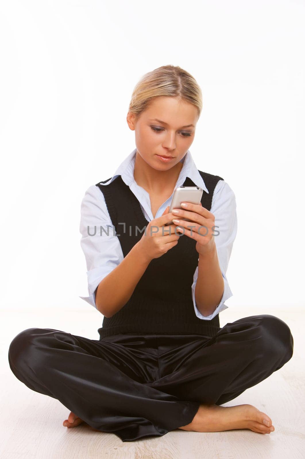 Young business woman is talking by cell phone