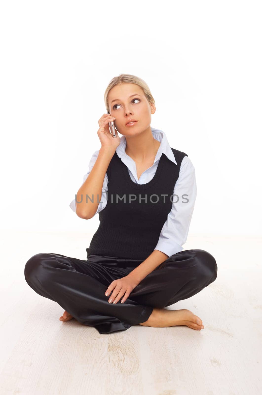 Young business woman is talking by cell phone