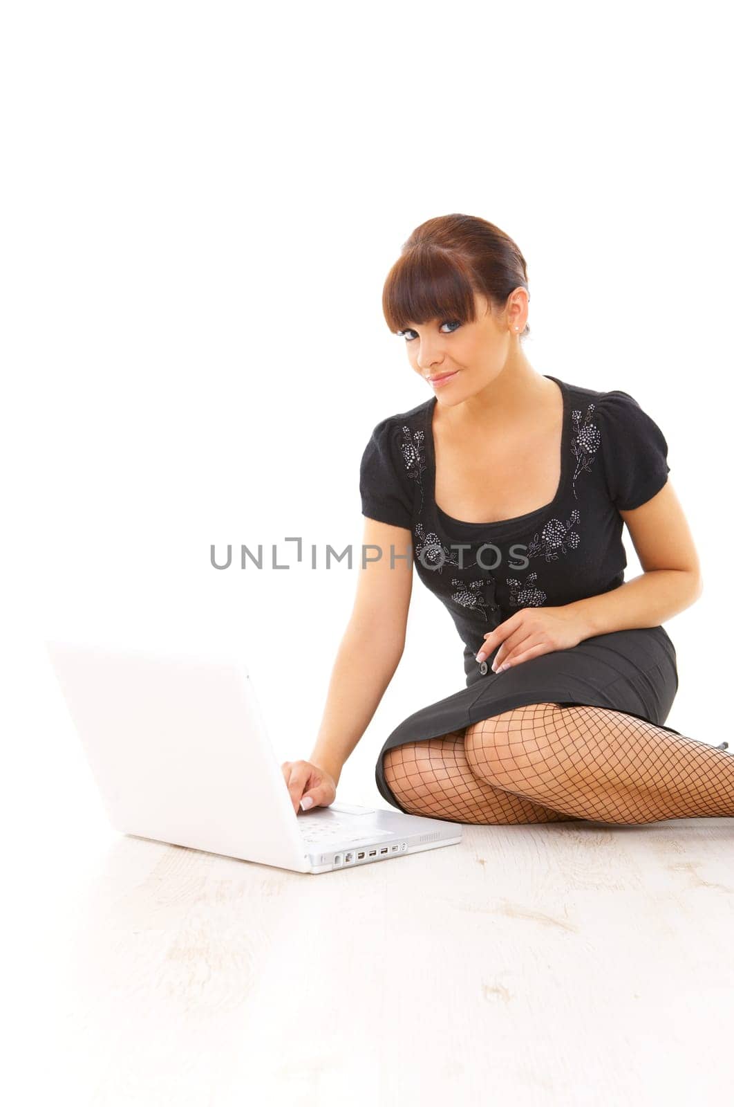 Portrait of young beautiful business woman working on computer